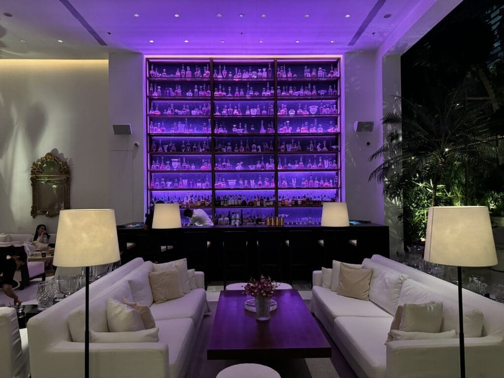 The Lobby Bar with sleek neon pink lighting